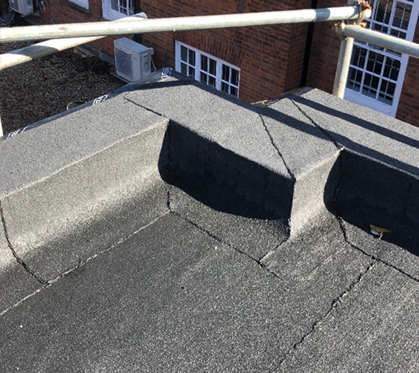 Building With Windows Near Rooftop